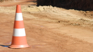 dirt-with-roadwork-cone